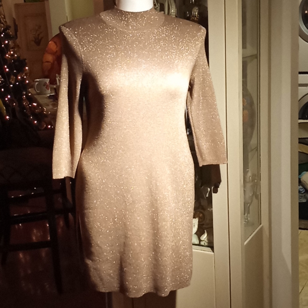 Golden long sweater with open sides